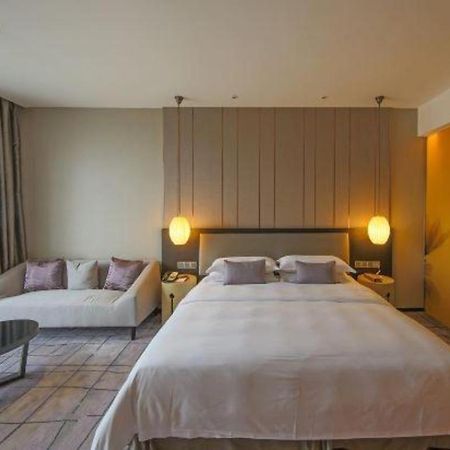 Maison New Century Hotel Dongguan Дунгуань Экстерьер фото