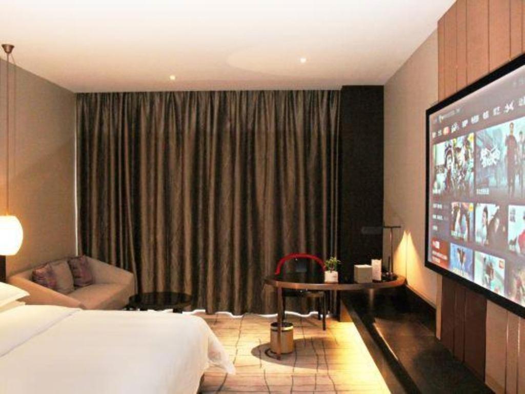 Maison New Century Hotel Dongguan Дунгуань Экстерьер фото