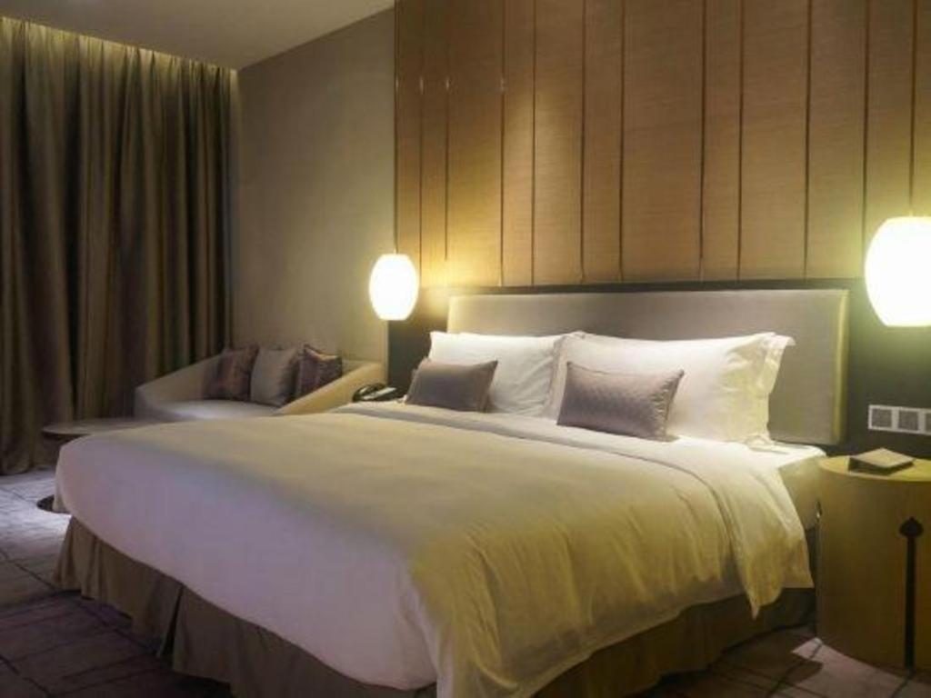 Maison New Century Hotel Dongguan Дунгуань Экстерьер фото