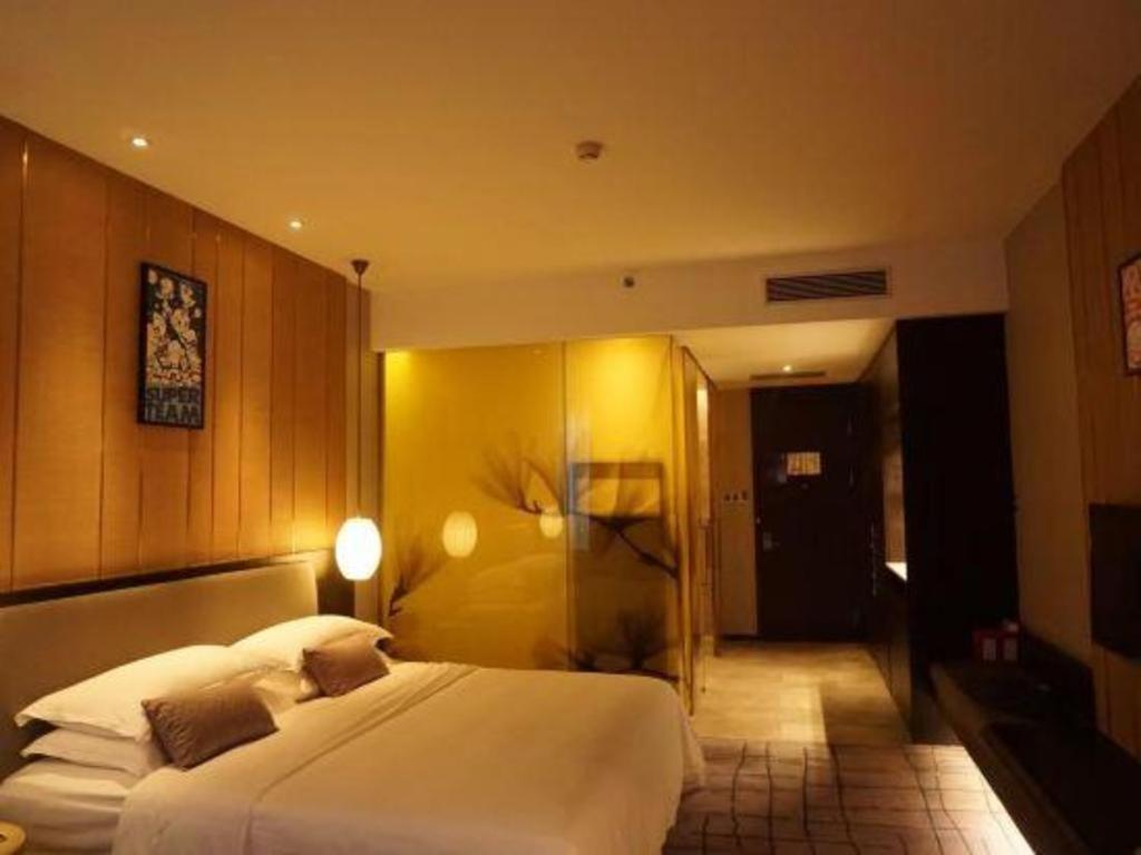 Maison New Century Hotel Dongguan Дунгуань Экстерьер фото