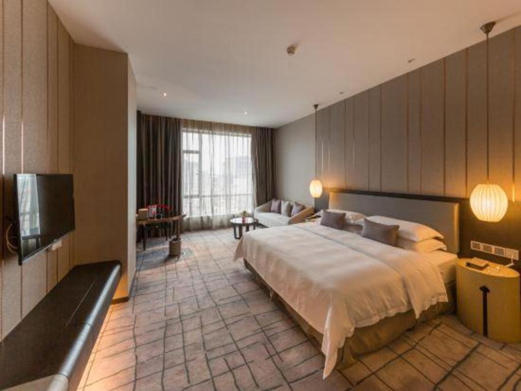 Maison New Century Hotel Dongguan Дунгуань Экстерьер фото