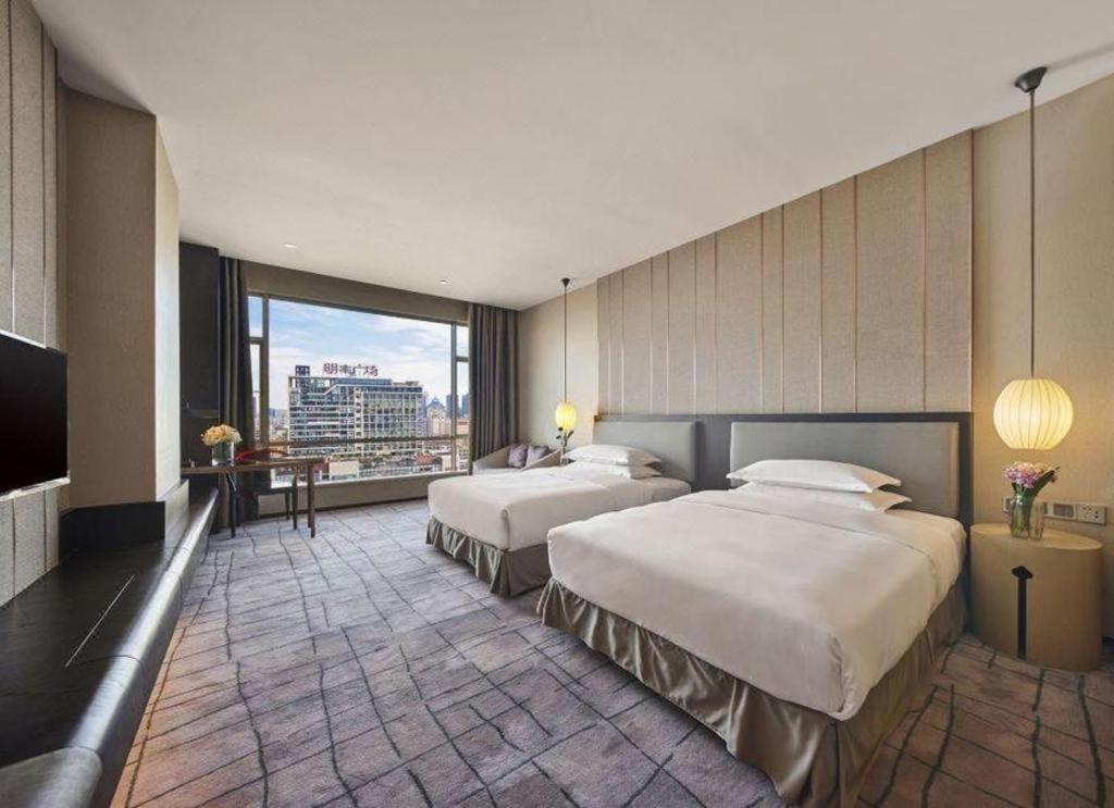 Maison New Century Hotel Dongguan Дунгуань Экстерьер фото