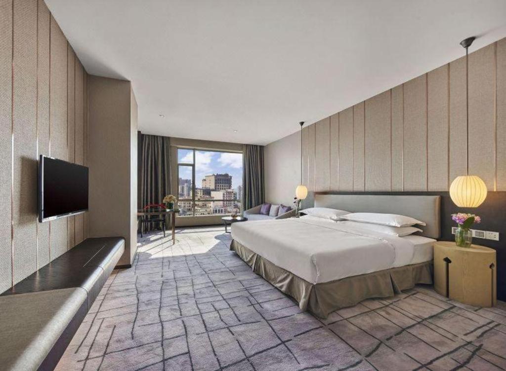 Maison New Century Hotel Dongguan Дунгуань Экстерьер фото