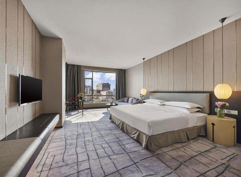 Maison New Century Hotel Dongguan Дунгуань Экстерьер фото